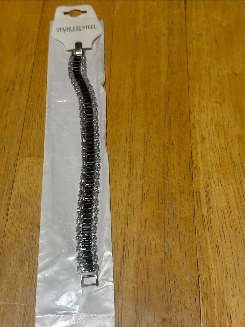 Black and Silver Bracelet-Style Phone Accessory